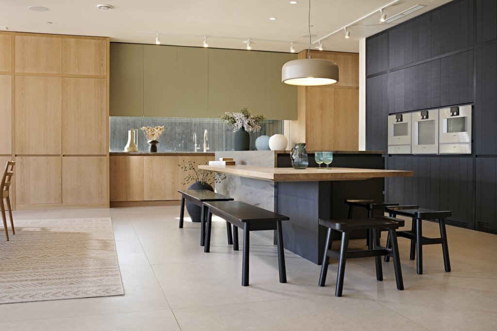 a low view of the Hidden Lake kitchen looking along the island towards the sink