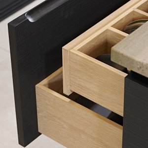 A detailed view of the open drawer showing the hidden cutlery drawer